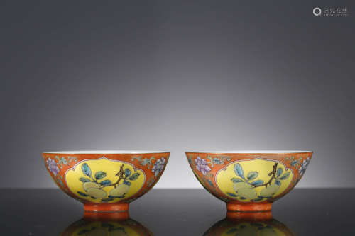 A Pair Of Red Ground Famille Rose Sanduo Bowls
