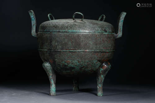 A Chinese Bronze Tripod Vessel And Cover
