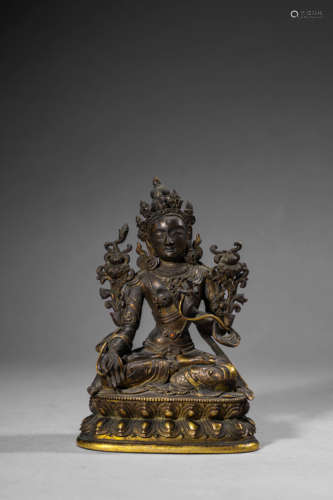 A Gilt-Bronze Statue Of Tara