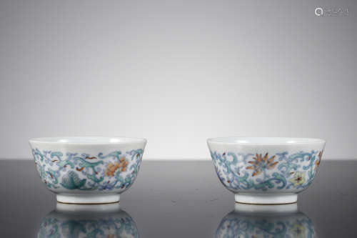 A Pair Of Chinese Doucai Interlocking Floral Cups, Yongzheng...