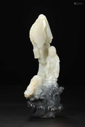 A Chinese Black And White Jade Boy And Guanyin Boulder