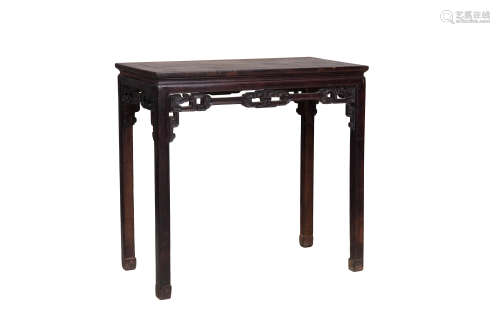 A Rosewood Trestle Half Table
