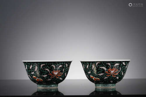 A Pair Of Black Ground Floral Bowls