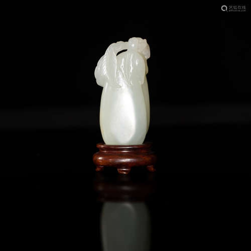 十八世紀   白玉瓜果掛墜（附木座）A Chinese carved white jade m...