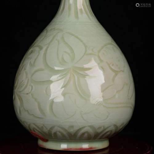 Pure cyan koryo porcelain carved around flowers fills the ho...
