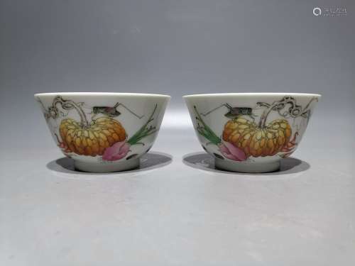 Lang shining, colored enamel cups of fruits and vegetables, ...