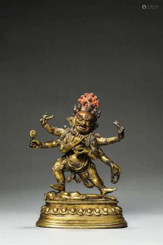 A gilding copper six-armed Mahakala statue