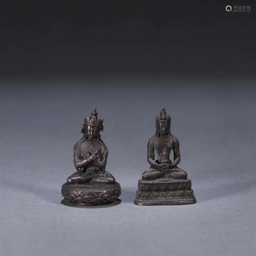 A set of silver buddha statues