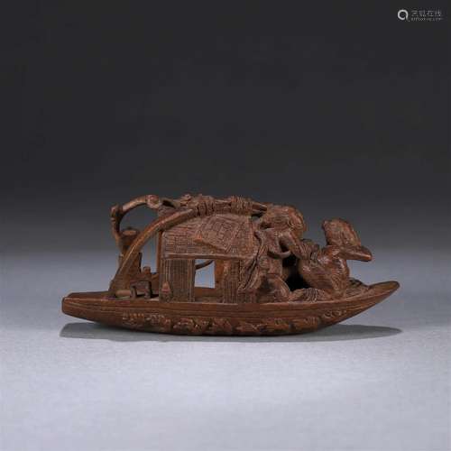 A bamboo carved boat ornament