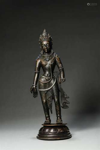 A silver-inlaid copper Guanyin bodhisattva statue