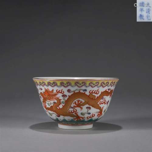 A famille rose iron red dragon and phoenix porcelain bowl