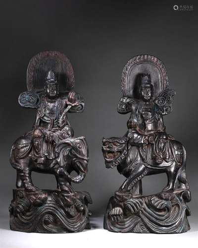 A set of red sandalwood bodhisattva statues