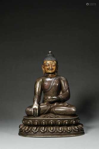 A silver buddha statue