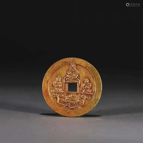 A buddha patterned gold coin