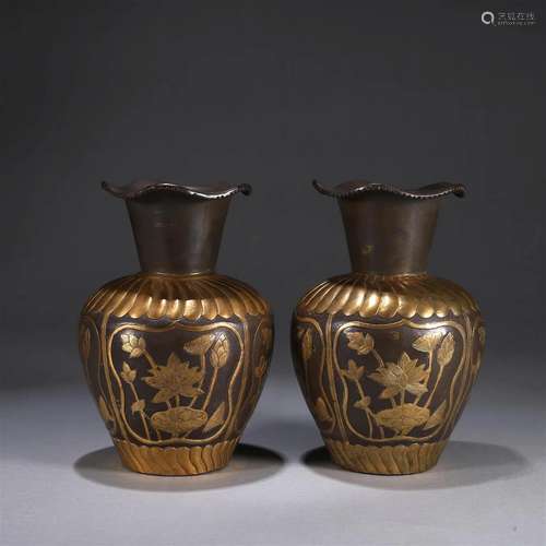 A pair of lotus patterned gilding silver vases