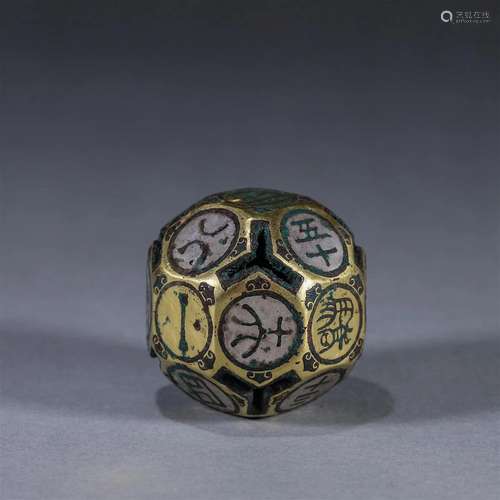 A silver and gold-inlaid bronze dice