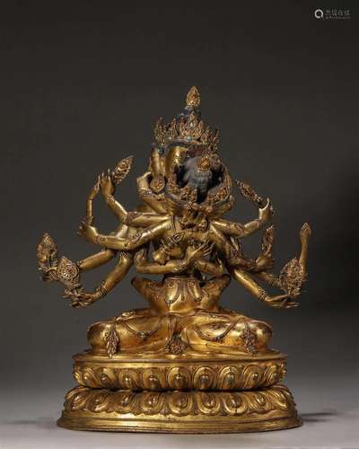 A gem-inlaid gilding copper buddha statue