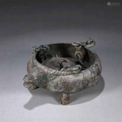 A bronze ox shaped pot