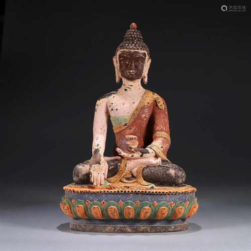 A painted glass Sakyamuni buddha statue