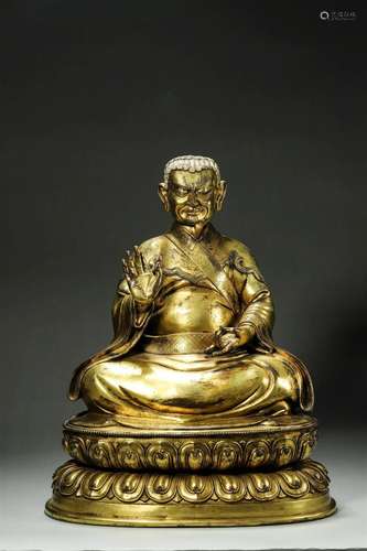 A gilding copper buddha statue