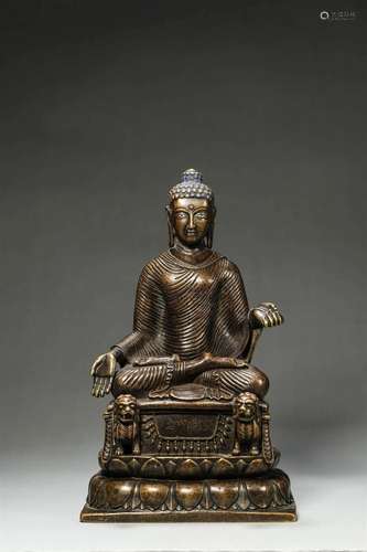 A silver-inlaid copper Sakyamuni buddha statue