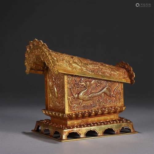 A dragon and phoenix patterned gold coffin