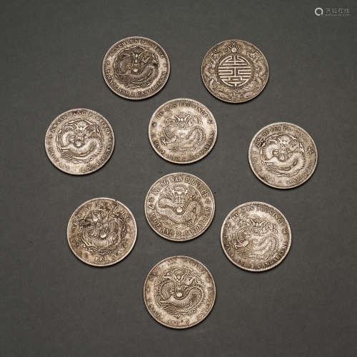 Nine Guangxu Yuanbao Silver Coins