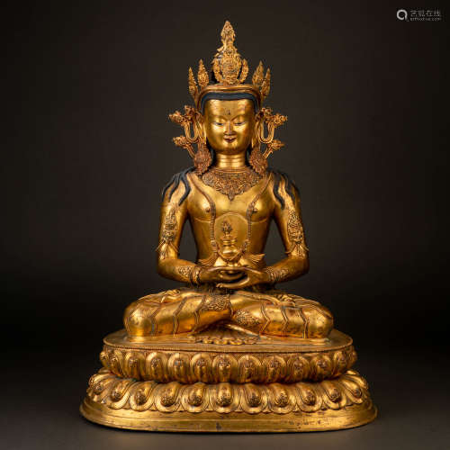 A Gilt Bronze Figure of a Seated Buddha, Ming Dynasty