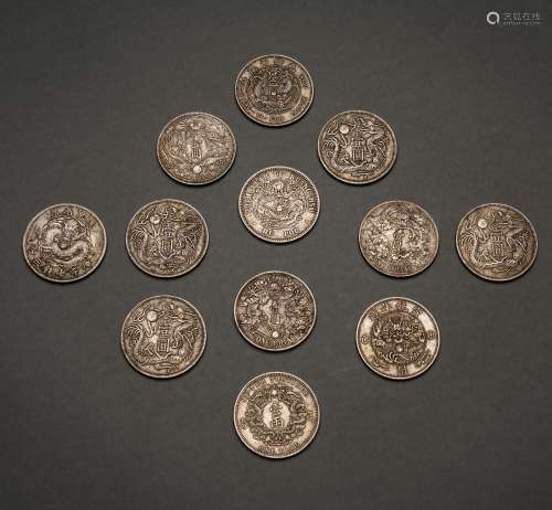 Twelve Qing silver coins