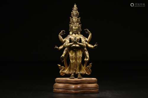 : copper and gold guanyin stands resemble ten eight side arm...