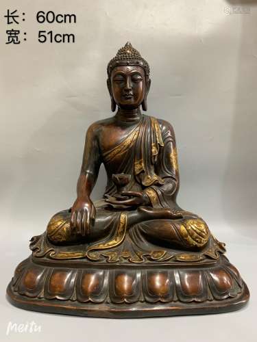 Copper and gold Buddha