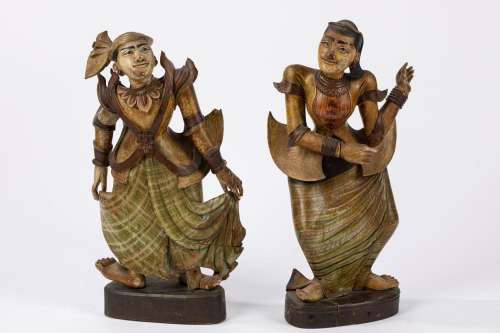 Two carved wood dancing figures. South East Asia, early 20th...