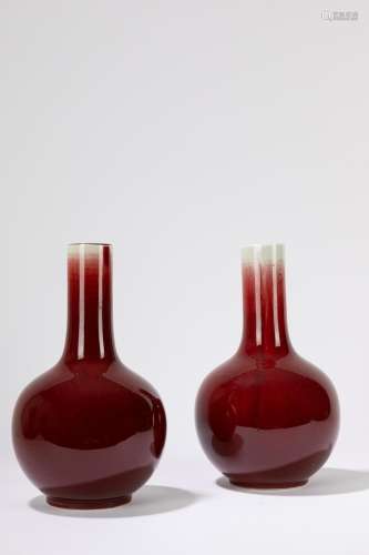 A pair of sang de beouf glaze porcelain vases. China, 20th c...