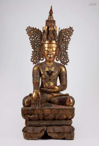 A lacquered and partial gilt wood Jambupati Buddha. Burma, e...