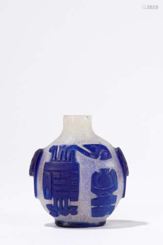 A white and blue glass snuff bottle. China, late 19th centur...