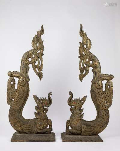 A pair of dragon shaped wood sculptures. South East Asia/Tha...