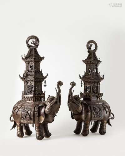 A pair of large bronze elephant-shaped censers. China, 19/20...