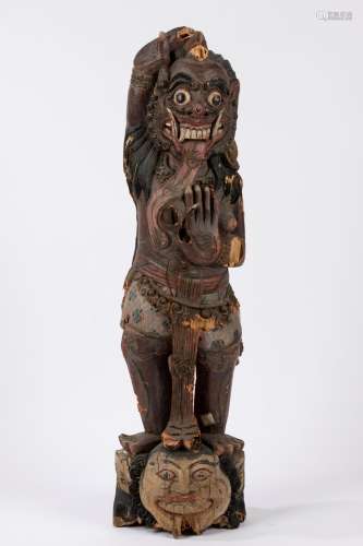 A carved wood sculpture of a demon. China/Tibet, early 20th ...