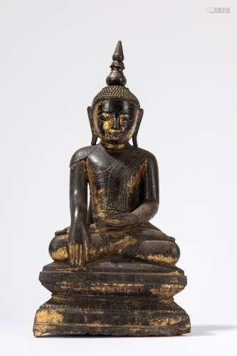A part gilt wood seated Buddha. South East Asia, 19th centur...