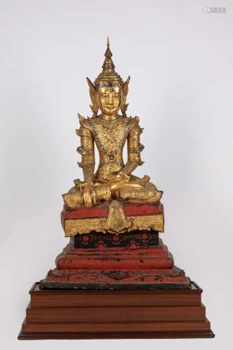 A gilt and lacquered papier-mâché Buddha. Thailand, early 20...