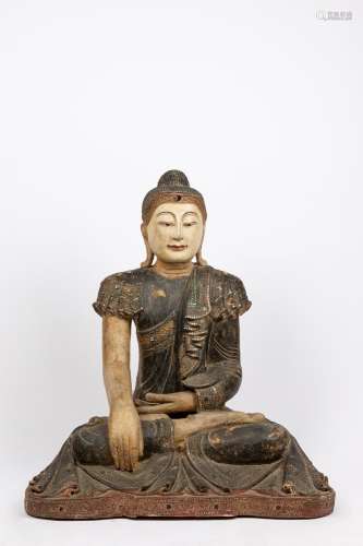 A polycrome wood seated Buddha. South East Asia, early 20th ...