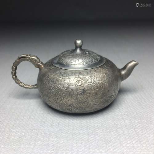 Silver teapotSize:Three high 75/51/39 mmWeighing about 30 gr...