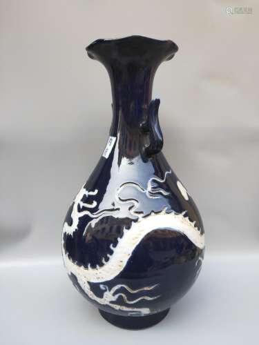 Nei, ji blue glaze hand-cut panlong bottles.36.5 CM high, di...