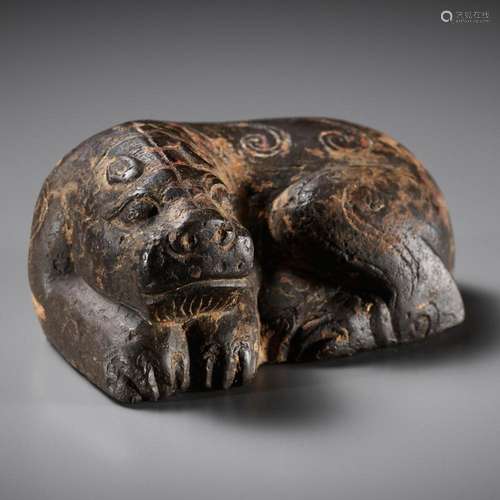 A LIMESTONE ‘LION’ MAT WEIGHT, HAN DYNASTY