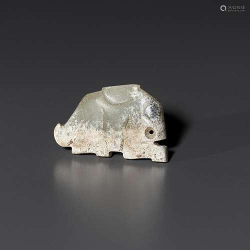 A PALE CELADON JADE ‘HARE’ PENDANT, LATE SHANG TO WESTERN ZH...