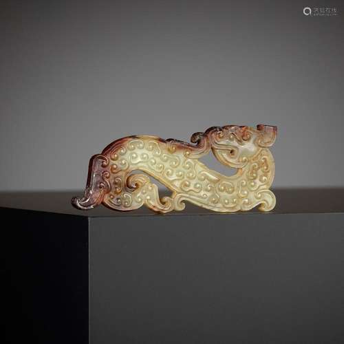 AN ARCHAIC YELLOW & RUSSET JADE DRAGON PENDANT, EASTERN ...