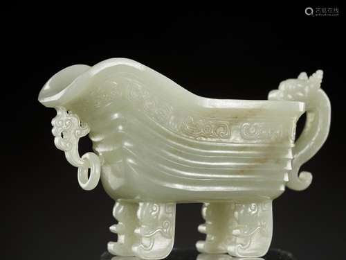 A PALE CELADON JADE POURING VESSEL, YI, QING DYNASTY