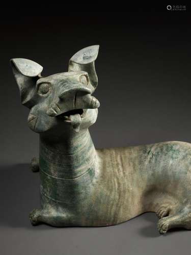 A LARGE GREEN-GLAZED RED POTTERY FIGURE OF A DOG, HAN DYNAST...