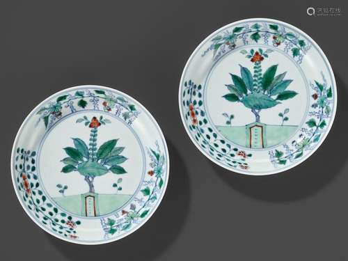 A RARE PAIR OF DOUCAI ‘POMEGRANATE AND FOLIAGE’ DISHES, YONG...