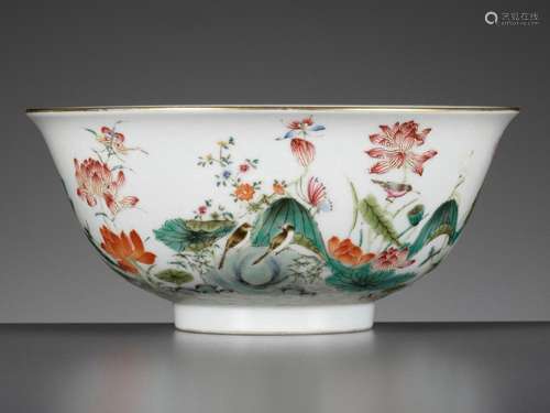 AN IMPERIAL FAMILLE ROSE ‘LOTUS POND’ BOWL, TONGZHI MARK AND...